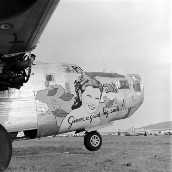 B-24 Liberator "Mabel's Labels" ... "Gimme a Great Big Smile!" engines removed and awaiting the smelter